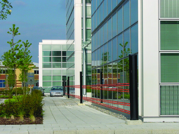 Beam tower along building